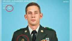 ZAROBLJENI AMERIKANAC PRIPADNIK HEMIJSKOG KORPUSA SAD Odao ga je ovaj amblem na jakni!